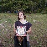 Moogie and her plaque (Thanks!)